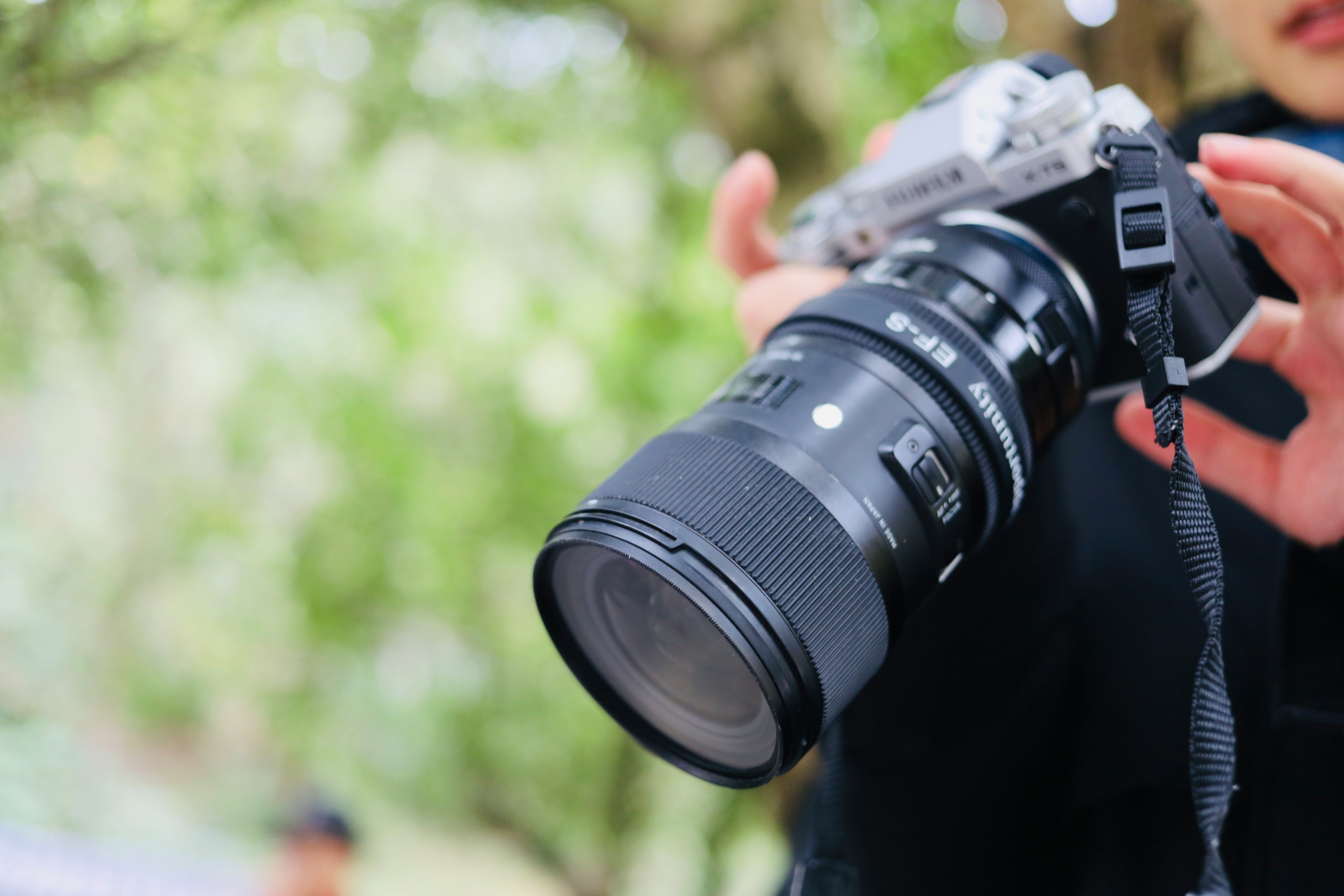 A photographer setting up beginner photography equipment for a shoot