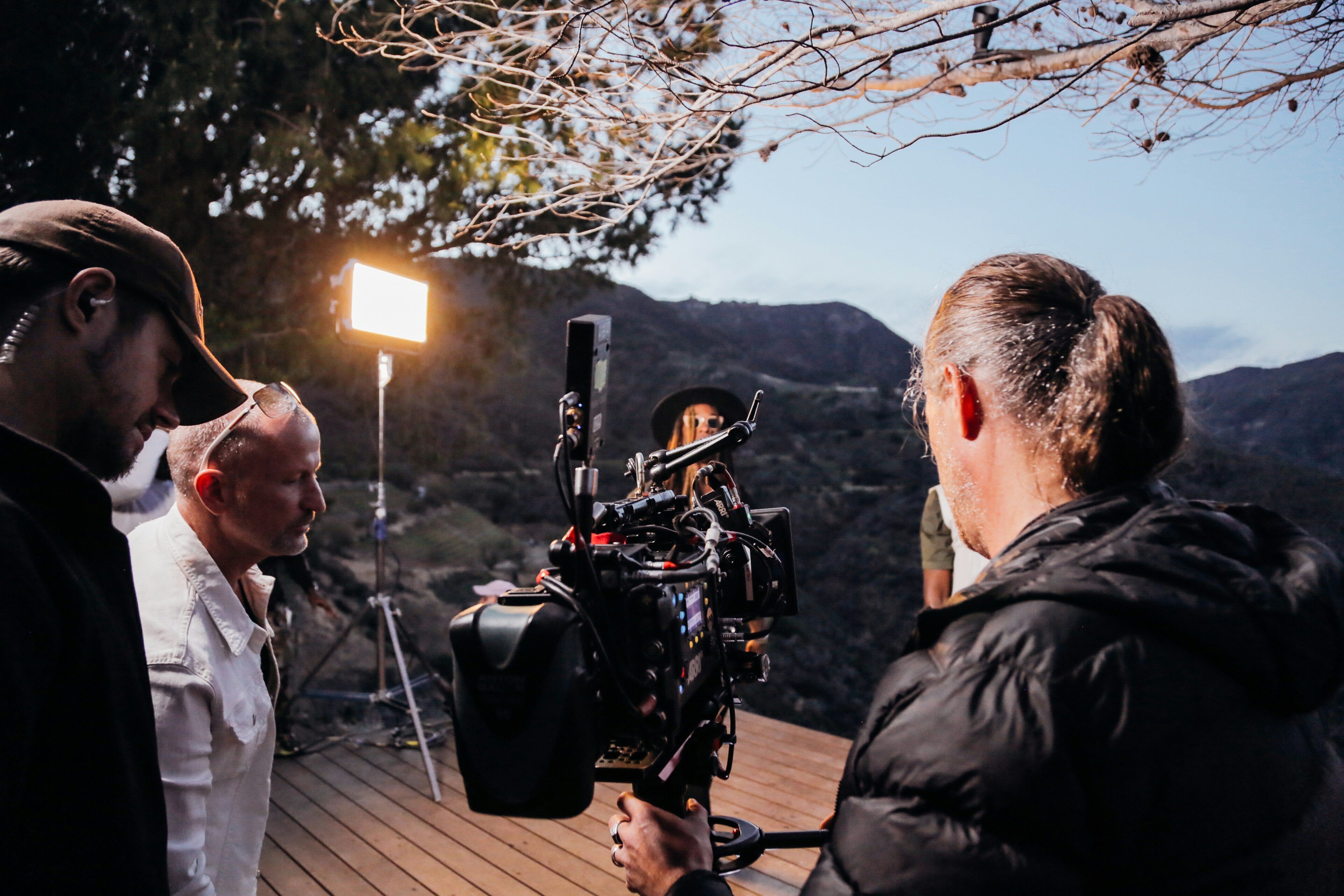 Using a reflector to bounce light onto a subject in outdoor photography  photography lighting techniques